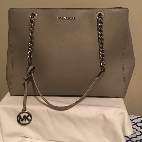 Michael Kors Handbags - 🔥Michael Kors, pre-owned, see description for details, has some life still.